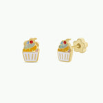 Introducing the Cupcake Enamel Flat Back Kids Earrings by JaxKelly—adorable gold stud earrings shaped like cupcakes and accented with colorful enamel, specially crafted for sensitive ears. Displayed from both front and side views against a clean white backdrop, these hypoallergenic earrings combine comfort and playful style, making them ideal for little ones.