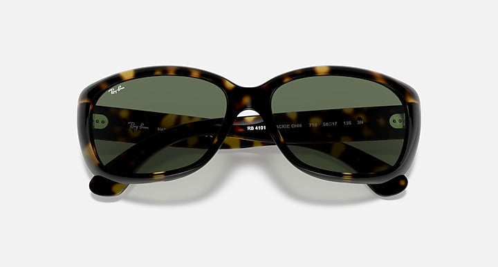 Ray-Ban 4101 sunglasses in tortoiseshell with green lenses are displayed front-facing on a plain white background, blending iconic style and versatility for any occasion.