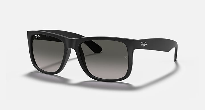 Ray-Ban 4165 Justin sunglasses featuring black rectangular frames and dark lenses, with Ray-Ban logos on both top corners, displayed against a plain white background.