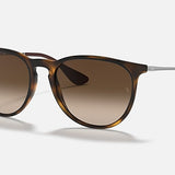 Ray-Ban 4171 Erika sunglasses with round tortoiseshell frames, brown gradient UV-protective lenses, and slim metal arms shown on a white background.