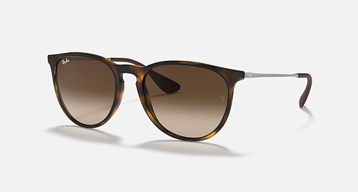 Ray-Ban 4171 Erika sunglasses with round tortoiseshell frames, brown gradient UV-protective lenses, and slim metal arms shown on a white background.