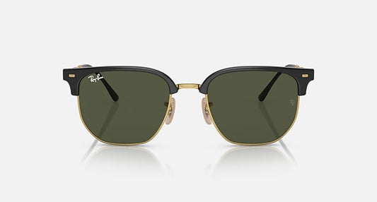 The Ray-Ban 4416 sunglasses feature dark green lenses, a black upper frame with gold detailing, and adjustable nose pads, presented against a plain light background for a timeless minimalist look.