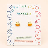 A pair of JaxKelly Candy Corn Enamel Flat Back Earrings displayed on a decorated card, featuring hypoallergenic, kid-friendly posts for sensitive ears.
