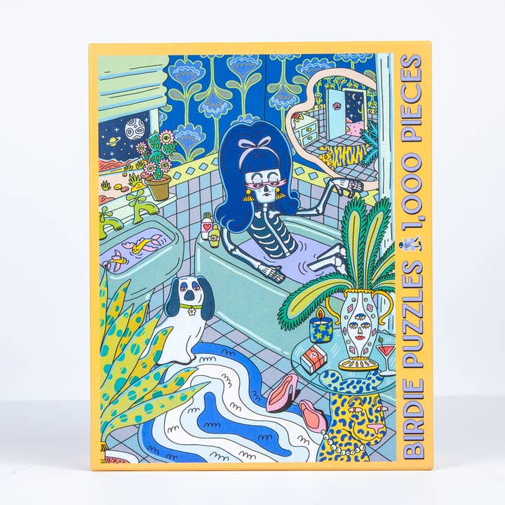 The Moonlight 1,000 Piece Puzzle by Birdie Puzzles features colorful art of a girl in a bathtub with plants, a dog, and bathroom items. Made in the USA. Box text: "BIRDIE PUZZLES 1,000 PIECES.