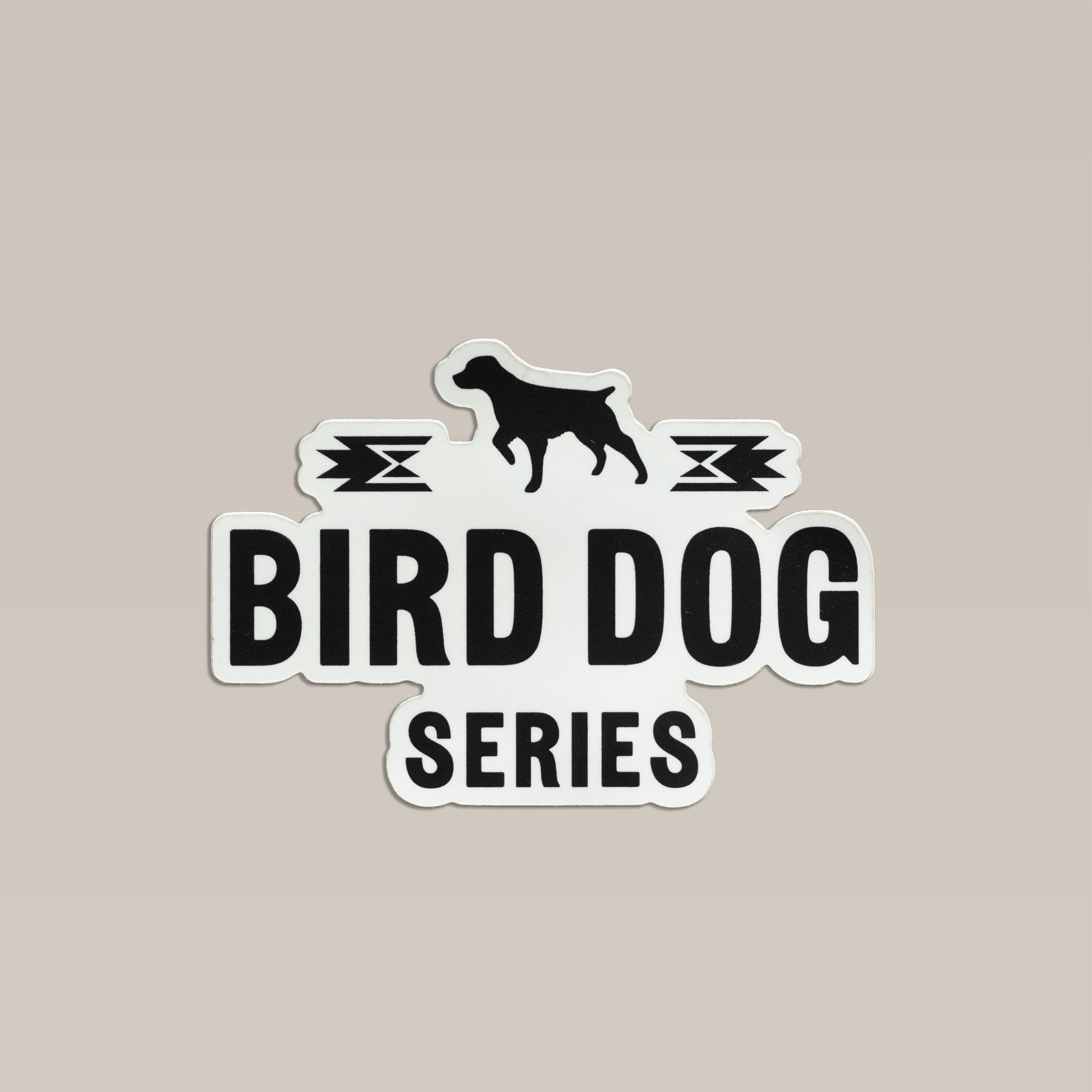 Bird Dog Series sticker featuring a pointing dog silhouette above the text “BIRD DOG SERIES” and geometric accents, celebrating a tradition of adventure.