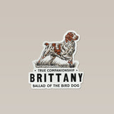 Brittany Spaniel Sticker featuring an embroidered patch illustration of a white and brown Brittany spaniel standing in grass above the text “TRUE COMPANIONSHIP,” “BRITTANY,” and “BALLAD OF THE BIRD DOG.”