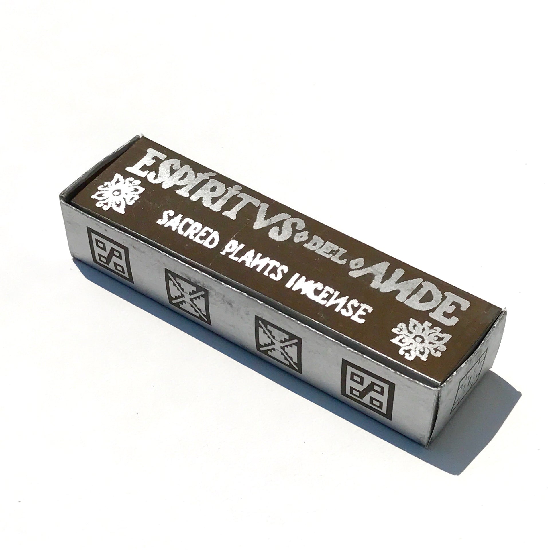 A rectangular box labeled "Espiritus del Ande Collection | Incausa" by Incausa features white patterns on a brown and silver background, offering handcrafted Peru Palo Santo blends for a premium natural incense experience.
