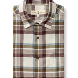 Huckleberry Cotton Flannel Sport Shirt by Duck Head featuring a long-sleeved cream, maroon, olive, and blue plaid pattern with a button-down collar.