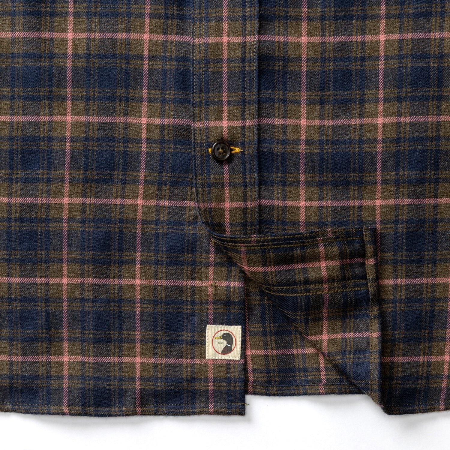 Blue and brown Cotton Flannel Sport Shirt Duck Head with a small circular logo patch near the bottom hem.