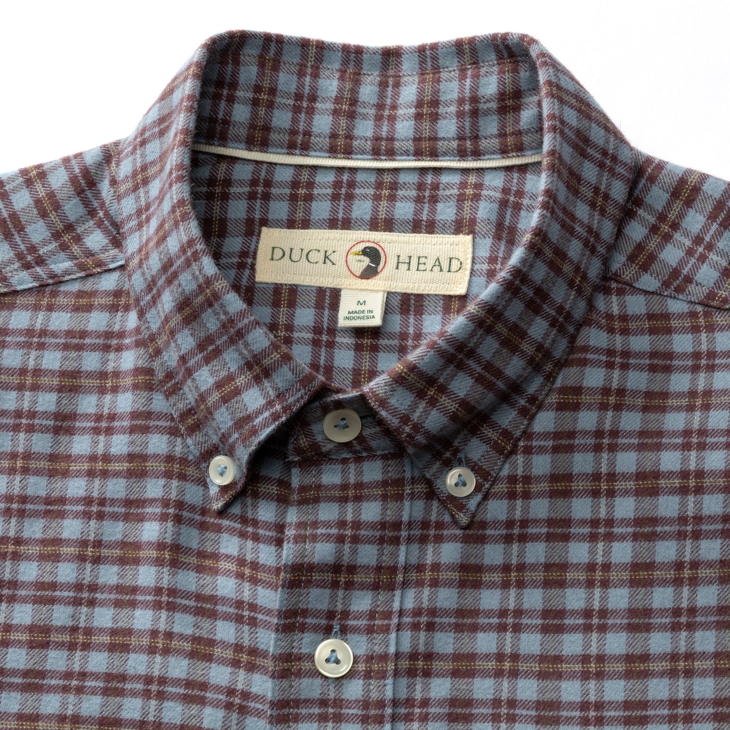 Close-up of a blue and brown Cotton Flannel Sport Shirt Duck Head featuring a button-down collar.