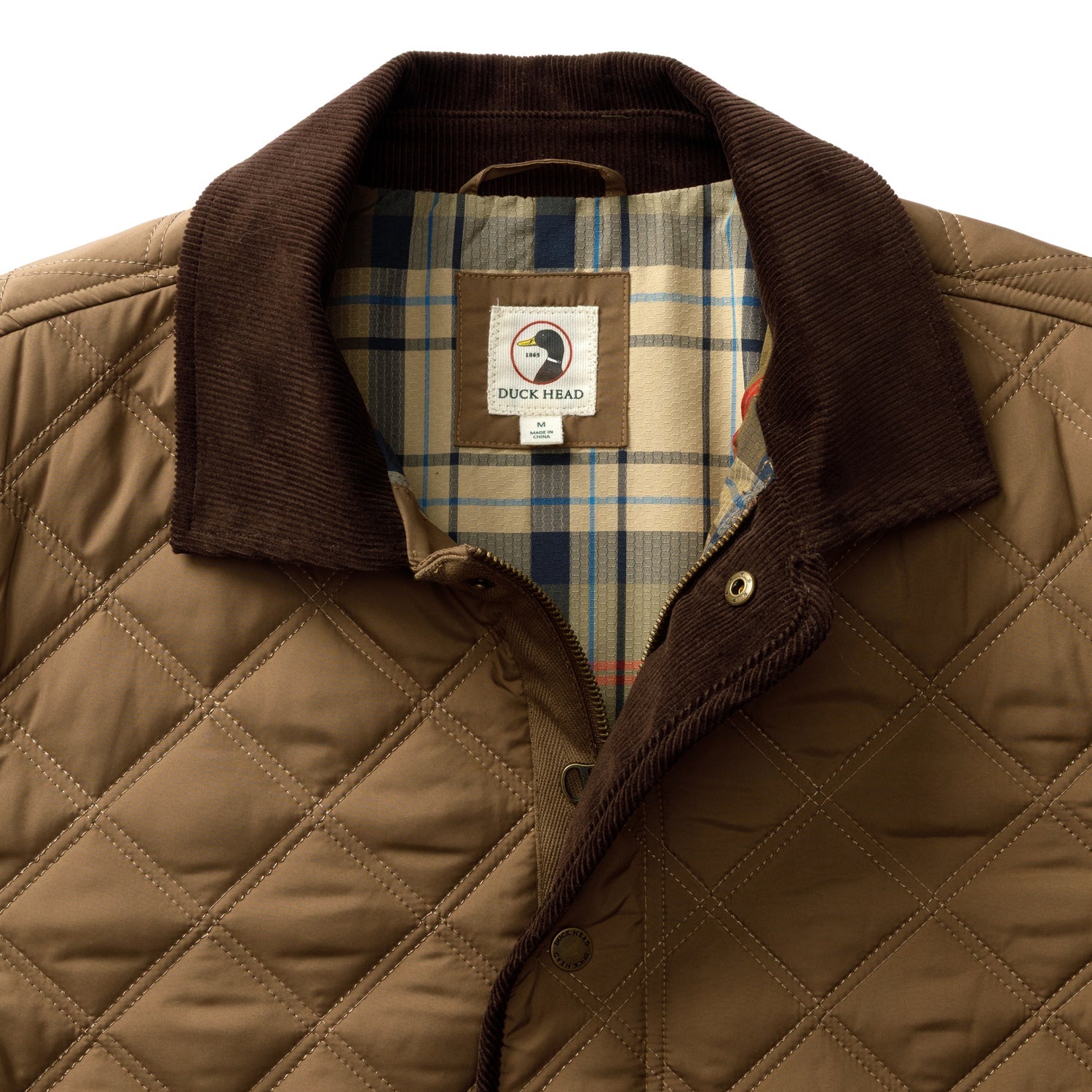 Duck Head Fremont Lodge Performance Quilted Jacket in tan recycled polyester with a brown corduroy collar, PrimaLoft insulation, and a blue and tan plaid lining.