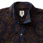 Pineview Fleece 1/4 Snap Pullover by Duck Head in a blue, brown, and orange patterned print with a navy blue placket.