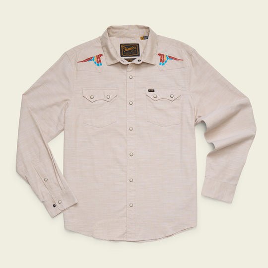 Howler Brothers Crosscut Deluxe long-sleeve western shirt in beige, featuring snap buttons, front pockets, and colorful bird embroidery on the shoulders inspired by Parrot Patrol, displayed on a plain background.