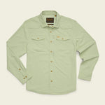The Howler Brothers Emerger Tech Longsleeve, a light green UPF shirt designed for sun protection, features two chest pockets, buttoned cuffs, and a branded patch on the inside collar. It is displayed laid flat on a light background.