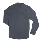 A long-sleeve Stamford Work Shirt in Concho Blue by Sendero Provisions Co. is laid flat, shown from the back with visible seams and a small stitched detail near the collar.