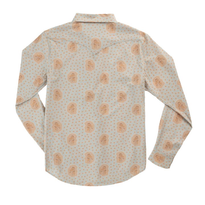 The Confluence Tech Long Sleeve Shirt by Sendero Provisions Co. features a Western fit and a light background adorned with a repeating beige abstract face and dot pattern. Seen from the back, this button-up shirt is crafted from performance wicking fabric with just the right amount of stretch to ensure both comfort and effortless style.