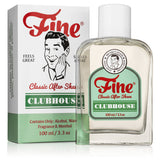 A bottle of Fine Accoutrements' Clubhouse Aftershave (100 ml) stands before its packaging, which showcases retro-inspired graphics and text reminiscent of a classic barbershop aftershave.