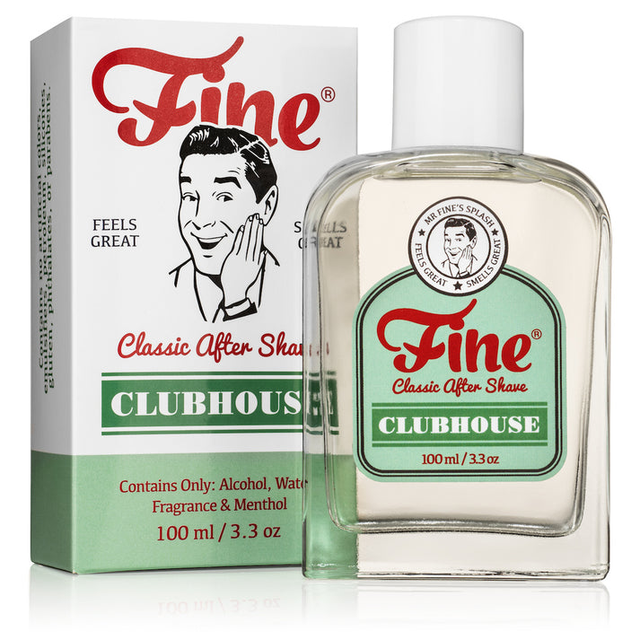 A bottle of Fine Accoutrements' Clubhouse Aftershave (100 ml) stands before its packaging, which showcases retro-inspired graphics and text reminiscent of a classic barbershop aftershave.
