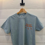 Small Town Revival Crop Ballad of the Bird Dog yankey blue cropped t-shirt with “Ballad of the Bird Dog” and three orange stars printed on the chest.
