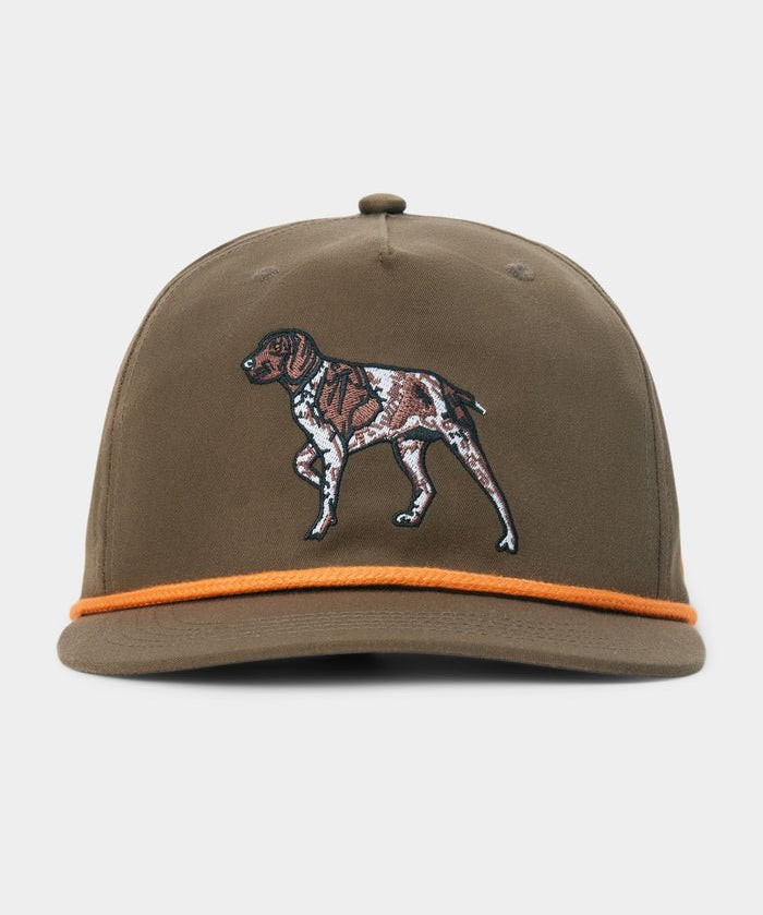 Introducing the Duck Camp Pointer Hat by Duck Camp: an olive green baseball cap featuring an embroidered dog on the front and a distinctive orange cord above the brim. Designed with a comfortable polyester shell and a classic snapback closure for easy adjustment.