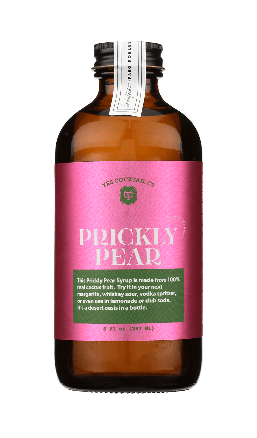 A brown glass bottle with a pink label reading "Prickly Pear Syrup | Yes Cocktail Co" contains a vibrant syrup made from real prickly pear juice, perfect for cocktails, crafted by Yes Cocktail Co.