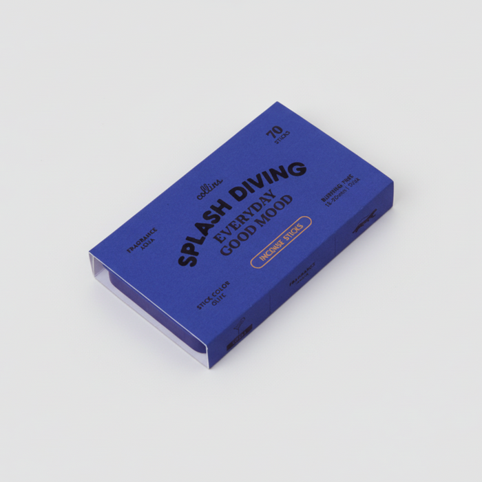 A closed blue rectangular box labeled “Splash Diving Incense Sticks | Collins” by Collins contains 70 fragrant “Midnight Sticks,” each offering an invigorating aqua scent from natural ingredients. The product is shown against a plain white background.