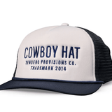 Stay cool in the Cowboy Hat mesh trucker hat by Sendero Provisions Co., featuring "COWBOY HAT Sendero Provisions Co. Trademark 2014" embroidered in blue on a white and black design.