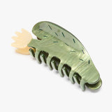 The Desert Bloom Succulent Claw Clip by Winona Irene is a playful hair accessory, crafted from cellulose acetate with leafy beige and dark details, adding charming style to your look.