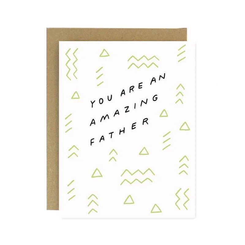 The Amazing Father's Day Card by Worthwhile Paper features "You are an amazing father" in black text with light green geometric patterns and includes a brown recycled paper envelope.