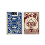 The Mollyjogger American Frontier Two Deck Card Set includes one blue box with bison and wolves, and one cream box with red "Bicycle American Frontier Predator Edition" text and a wolf, celebrating iconic wildlife in premium playing card detail.