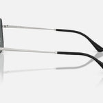 Side view of Ray-Ban 3758 Ari silver metal polarized sunglasses with black temple tips, featuring UV protection, displayed against a plain light gray background.