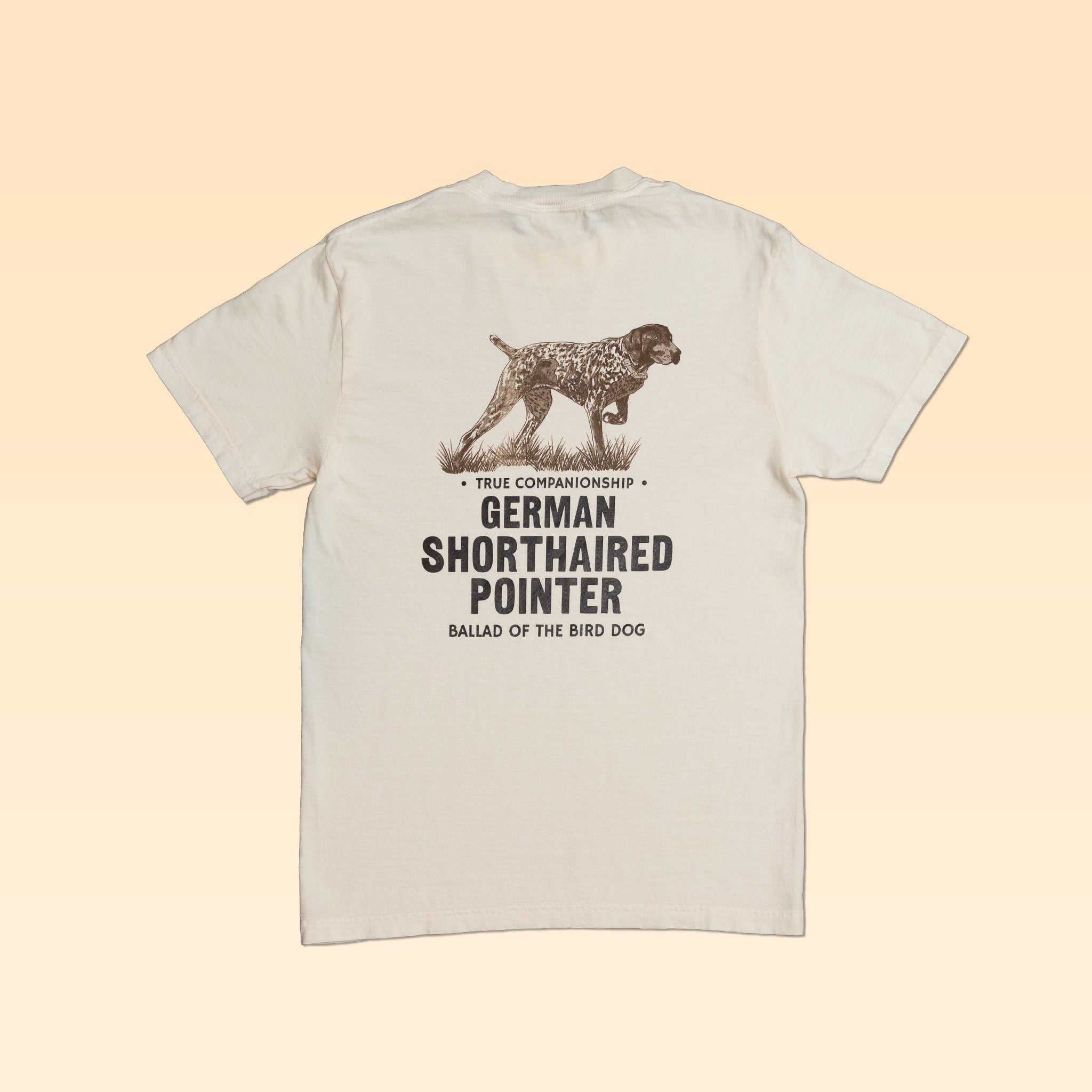 Off-white Comfort Colors Bird Dog Series Shirt | German Shorthaired Pointer featuring a German shorthaired pointer graphic above the text “True Companionship,” “German Shorthaired Pointer,” and “Ballad of the Bird Dog.”