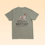 Olive green Bird Dog Series Shirt | Brittany featuring a back graphic of a Brittany spaniel with the text “TRUE COMPANIONSHIP,” “BRITTANY,” and “BALLAD OF THE BIRD DOG.”