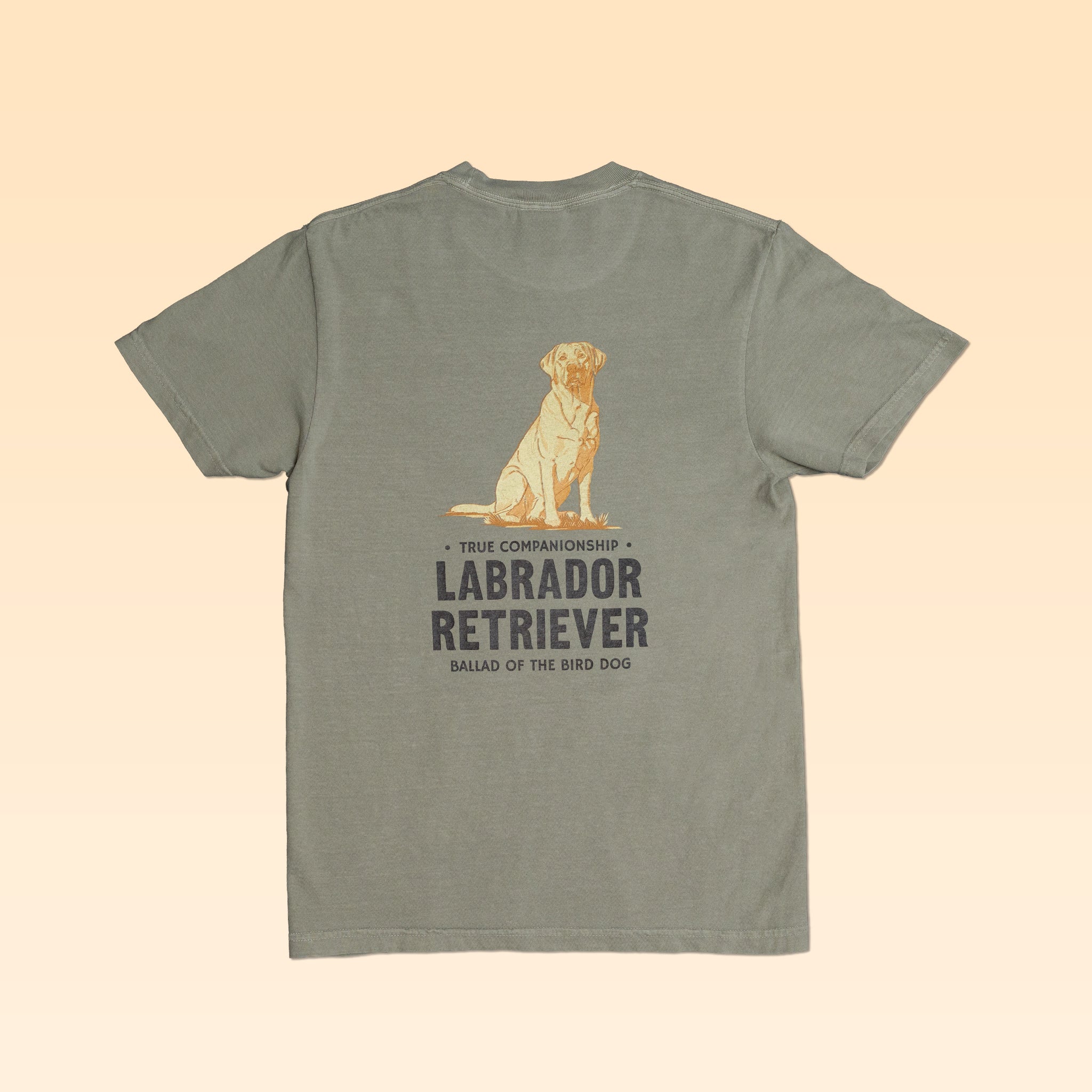 Olive green Comfort Colors Bird Dog Series Shirt | Labrador Retriever featuring a back graphic of a yellow Labrador with the text “True Companionship,” “Labrador Retriever,” and “Ballad of the Bird Dog.”