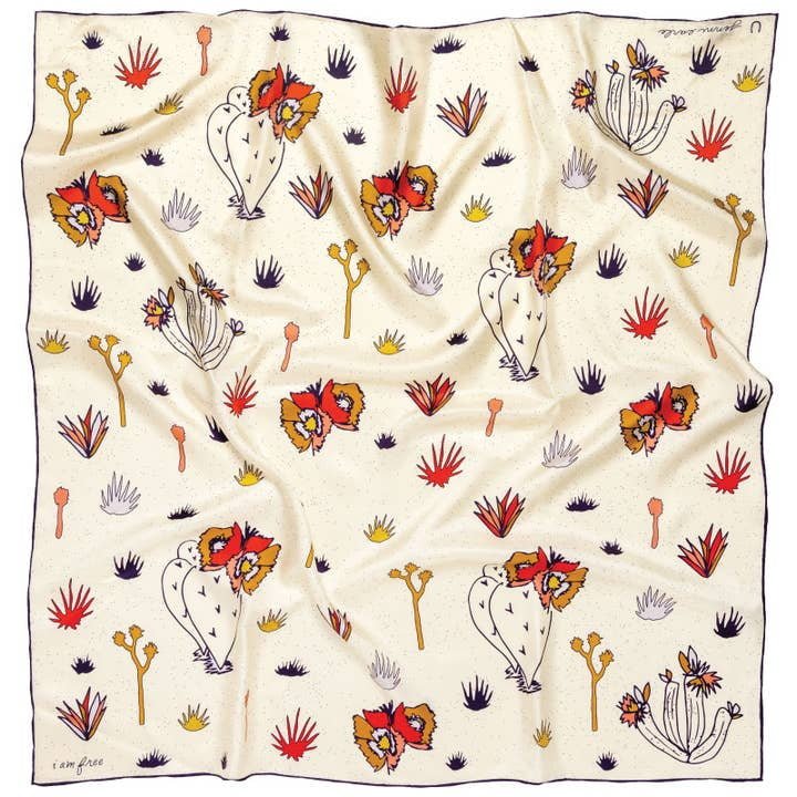 The Bandana | I am Free Cactus by Jenni Earle is a cream-colored, hand-illustrated silk scarf with cacti, flowers, and abstract patterns—making it a unique Valentine's gift.