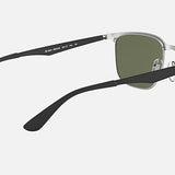 The Ray-Ban 3569 sunglasses feature silver metal frames, durable steel temples, and dark green lenses, shown from an angled rear view against a plain light background.