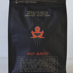 Black bag of Mescalito Coffee labeled "Blend Whole Coffee Beans | Kalimaz," featuring Ethiopian coffee from Guji Kalimaz, with branding, Brenham, Texas address, and a brief front description of flavor and purpose.