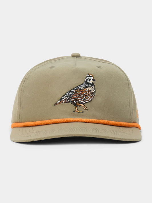 The Bobwhite Quail Hat by Duck Camp is a khaki snapback with an embroidered quail on the front, orange trim above the brim, adjustable snapback closure, and durable polyester shell.