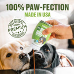 A hand pours Furvor Bone Broth For Dogs - Mobility Support from a green pouch into a bowl as a yellow and black dog watch. Text: "100% Paw-fection, Made in USA" and "Best Quality 100% Premium Guarantee.