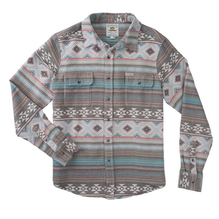 The Boquillas Long Sleeve Shirt by Sendero Provisions Co. features a brown, blue, gray, and white geometric pattern on cotton Jacquard, with a collar, button-up front, and two chest pockets for classic Southwest style.
