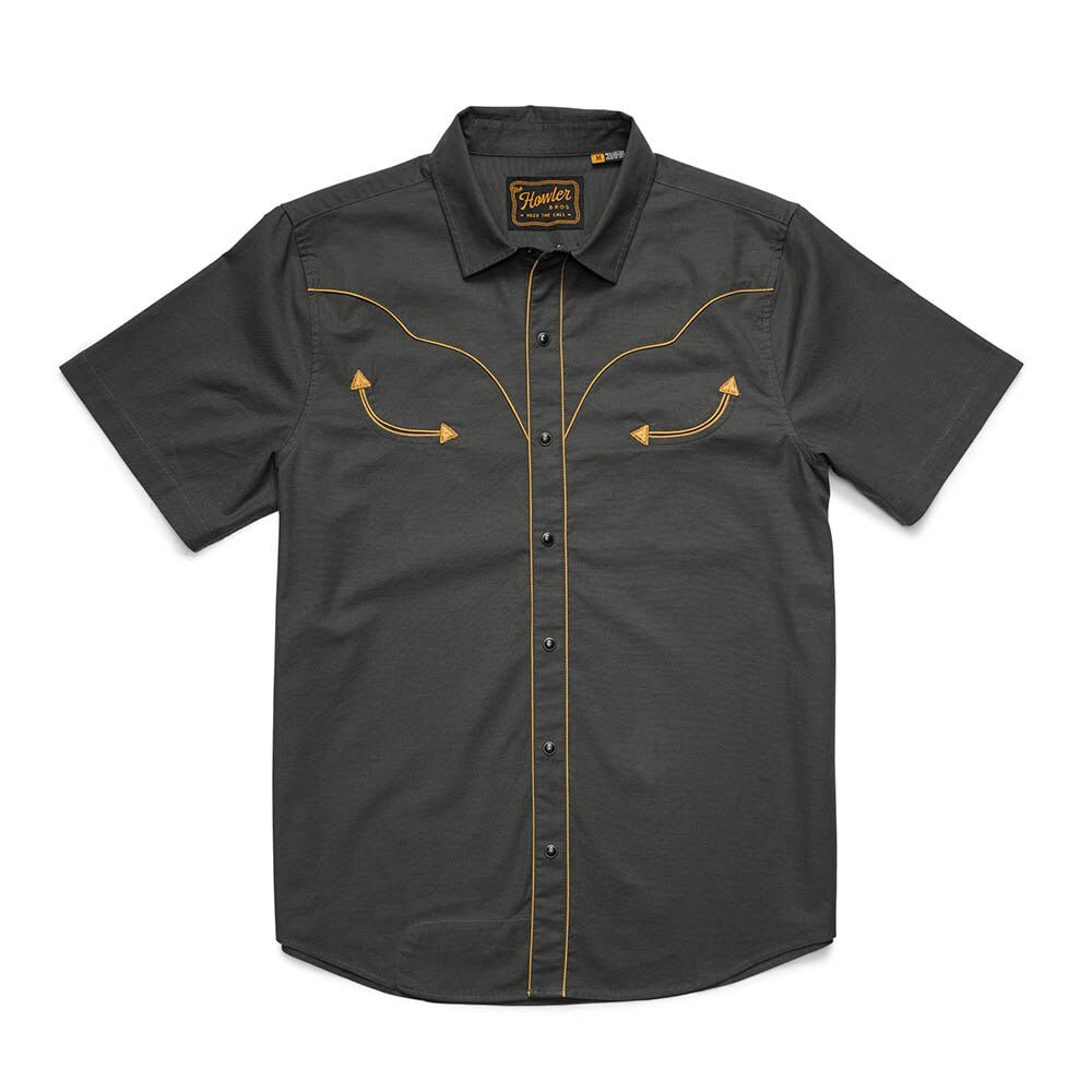 The Broncbuster Snapshirt by Howler Brothers is a dark gray short-sleeve Western shirt with yellow piping, arrow chest details, and vintage yokes, shown flat on a white background.
