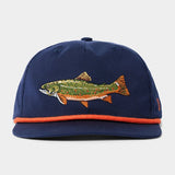 The Duck Camp Brook Trout Hat is a navy blue snapback with an embroidered fish on the front and orange trim along the brim.