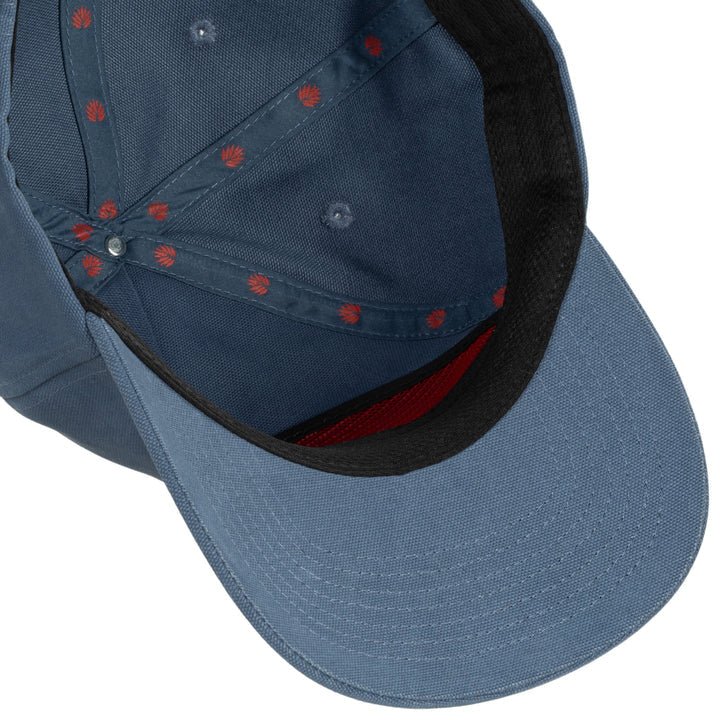 The image shows the inside of the Burro Lady Hat by Sendero Provisions Co.—a blue 5-panel cotton twill cap with a black inner rim, red stitching, and a snapback closure.