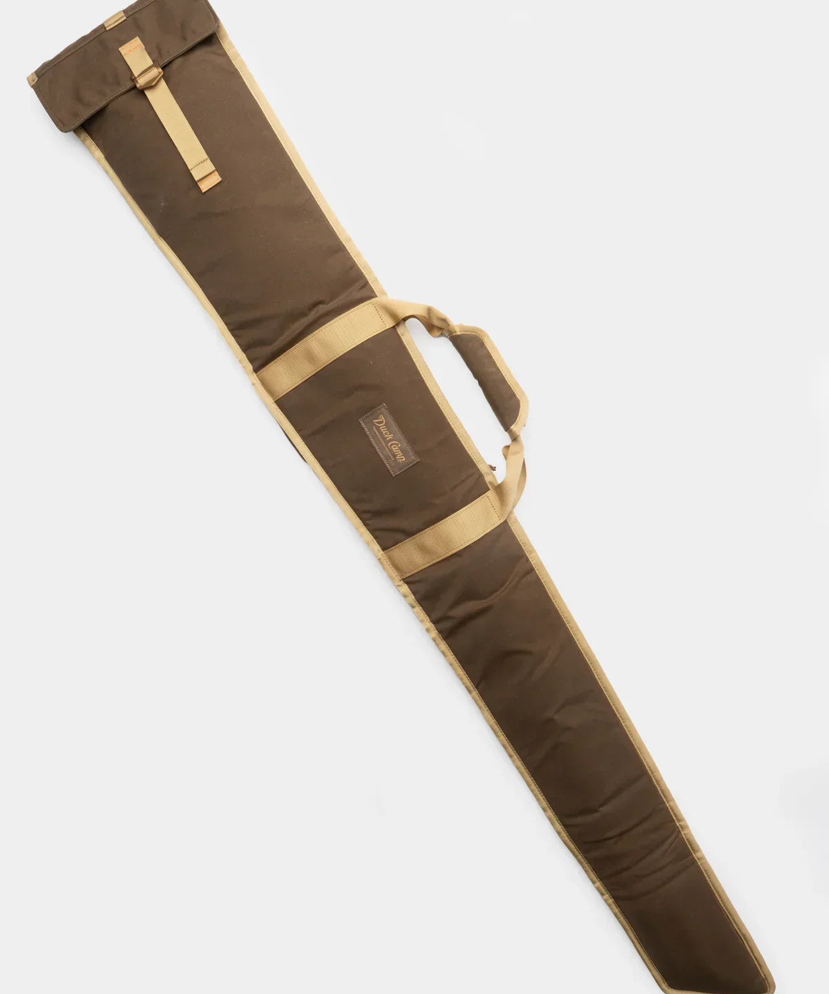 The Duck Camp Canvas Gun Sleeve is a brown and tan waxed cotton case with a handle, designed for carrying and protecting your rifle or similar long items.
