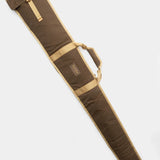 The Duck Camp Canvas Gun Sleeve is a brown and tan waxed cotton case with a handle, designed for carrying and protecting your rifle or similar long items.