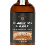 An 8 fl oz (237 ml) brown glass bottle of "Charred Oak & Maple" cocktail syrup by Yes Cocktail Co., featuring bourbon barrel aged oak, burnt sugar, and toffee flavors.