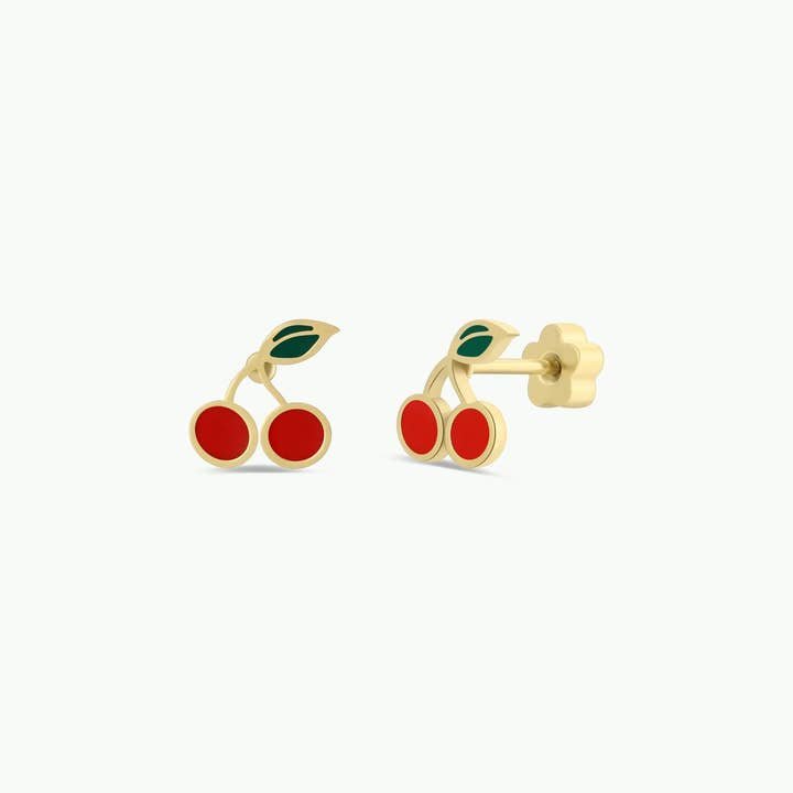The JaxKelly Cherry Enamel Flat Earring features gold stud cherries with red and green enamel, making these hypoallergenic earrings perfect for sensitive ears or as cute kids’ jewelry.