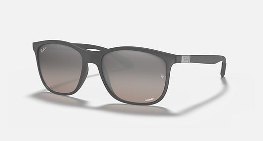 Ray-Ban Chromance rectangular sunglasses in sand grey with grey mirror silver lenses, featuring a small logo and silver temple detail, displayed on a plain light background.