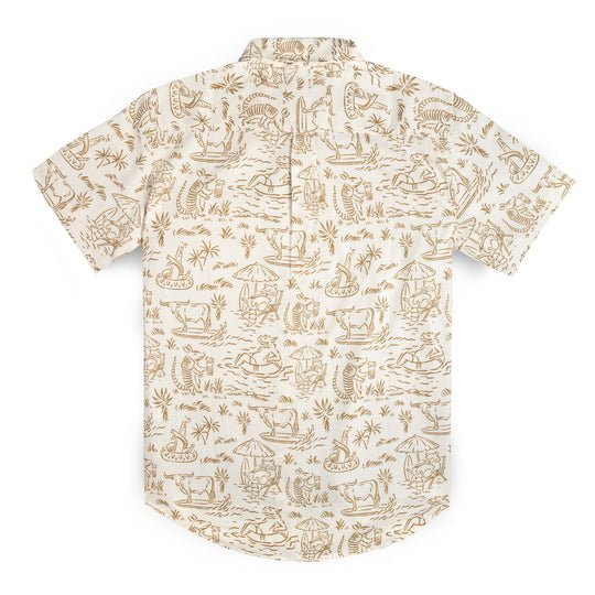 The Sendero Provisions Co. City Slicker | Texas Critter shirt is a relaxed-fit, short-sleeve, button-up beach shirt with an off-white base and light brown tropical print of people, animals, and palm trees. Shown from the back.
