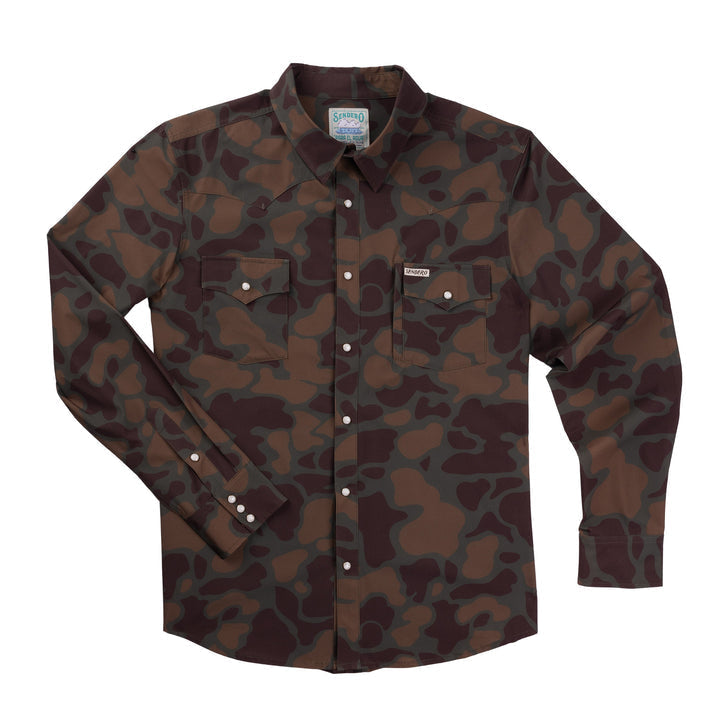 The Confluence Long Sleeve Tech Shirt by Sendero Provisions Co. features a tailored fit, brown and green camo pattern, Western pearl snaps, and dual chest pockets.